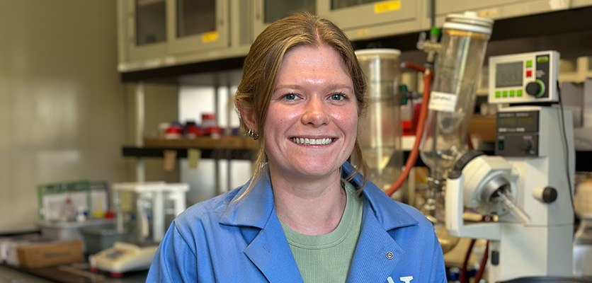 Diana LaFollette in a lab wearing a lab coat