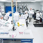 Scientists in a laboratory working with equipment