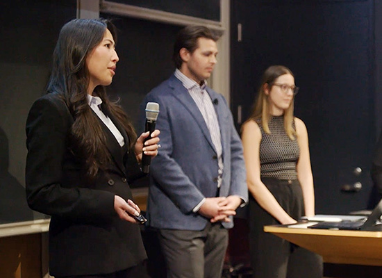 Students giving a presentation in a classroom