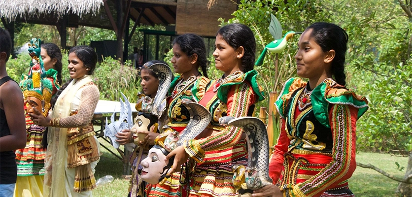 Children recreate a Sinhalese play during a celebration in Diyasaru Wetland Park/Tristan Bove